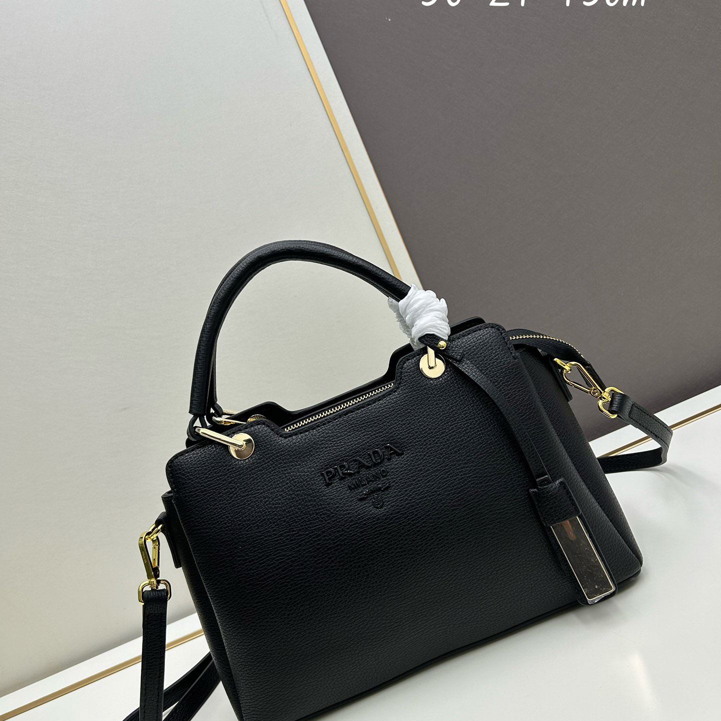 Pra*a top handle bags